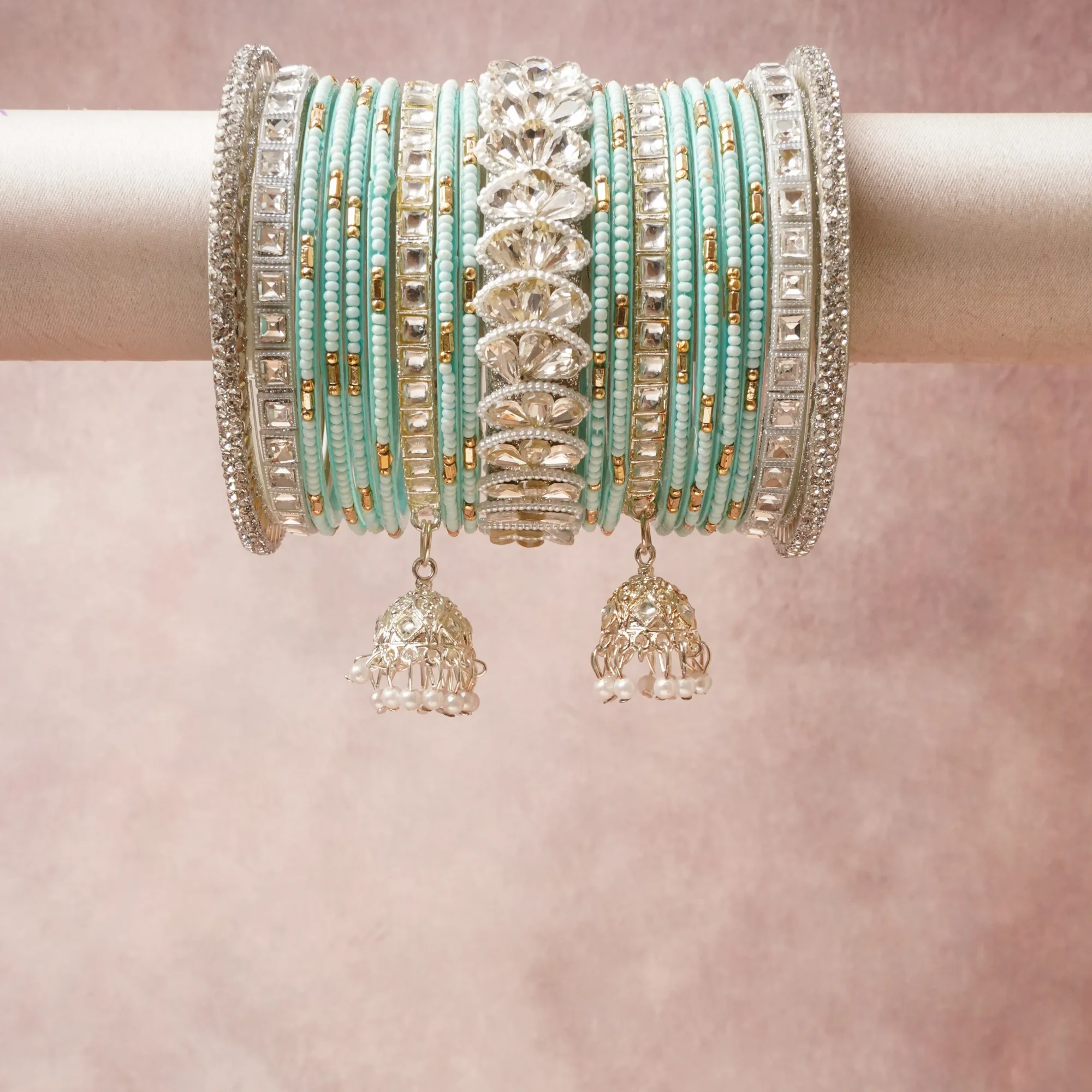 A commanding Pastel Turquoise anchors this beautiful set, enriched with accents of Silver, Gold, Clear Crystal, Cream Pearl that add depth and dimension.

Featuring a striking composition of Metal Alloy (Silver-toned), Metal Alloy (Gold-toned), Facet-cut Crystal, Glass Beads, Faux Pearls, this set carries intricate craftsmanship and strong presence. Grand in form, it is created for moments that deserve to be marked.
